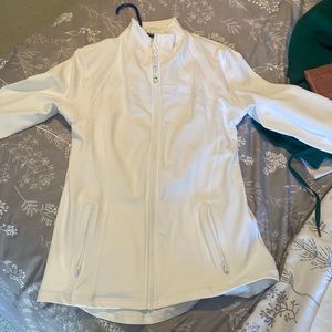 White Amazon zip up at her mix jacket